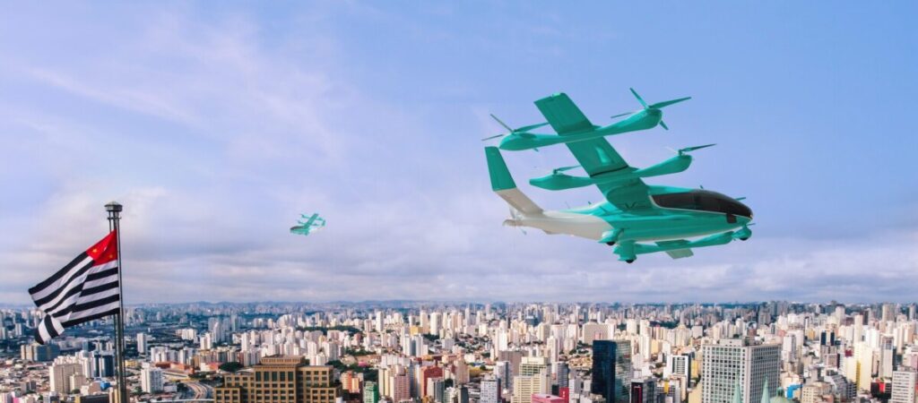 Imagem ilustrativa do avião elétrico eVTOL Embraer Eve voando em São Paulo