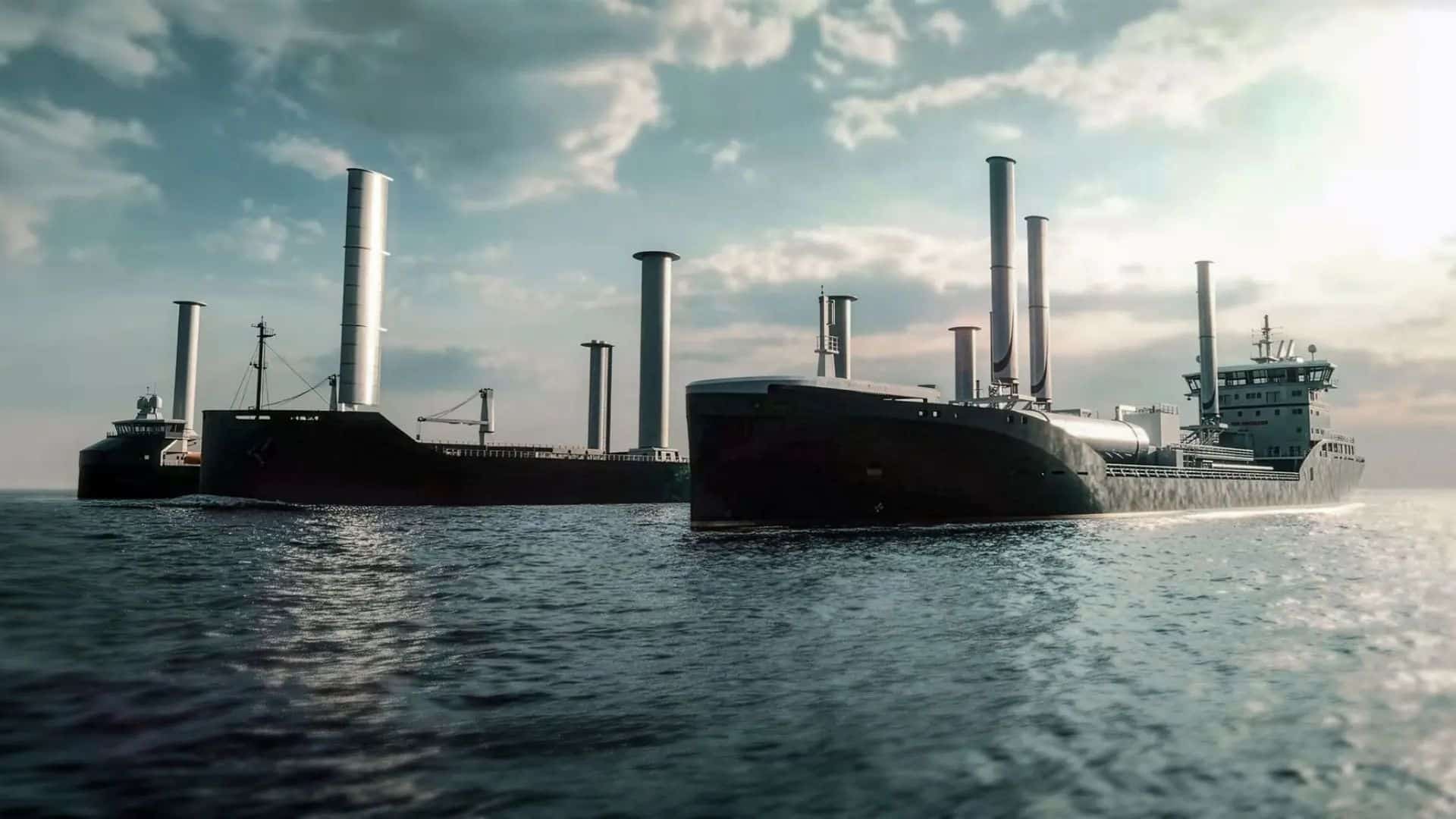 Navios cargueiros com velas de rotor (propulsão eólica) navegando em alto mar